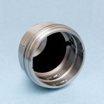 metallic circular component coated with acktar’s magic black coating
