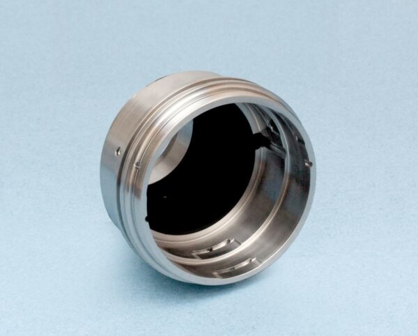 metallic circular component coated with acktar’s magic black coating